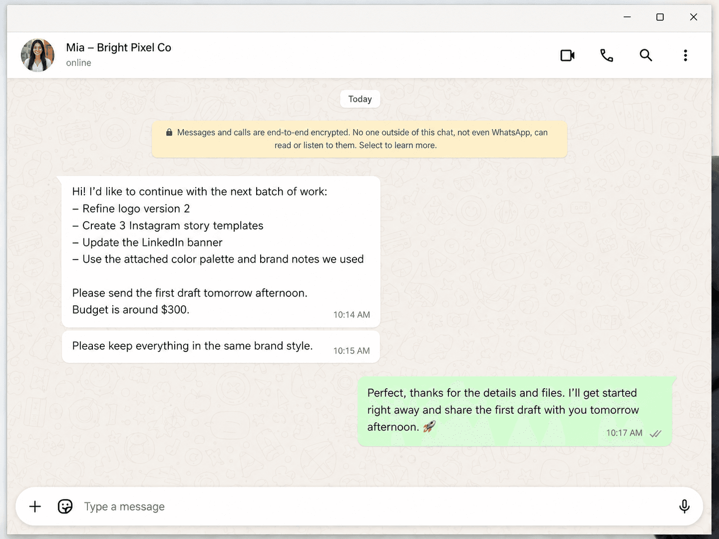 Client WhatsApp message with graphic design revision request.